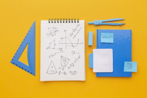 Top view school supplies composition - Image by Freepik